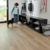 Boy and dog in a mudroom with Canadian Urban Oak RKP8116 floors