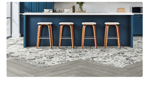 Kitchen is defined using Casablanca SP219 tiles from the WP311 herringbone floors in the rest of the home