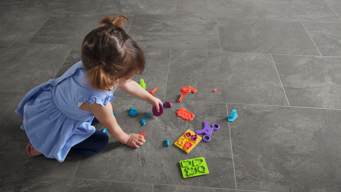 Little girl playing on Volcanic Slate RKT3001-G floors