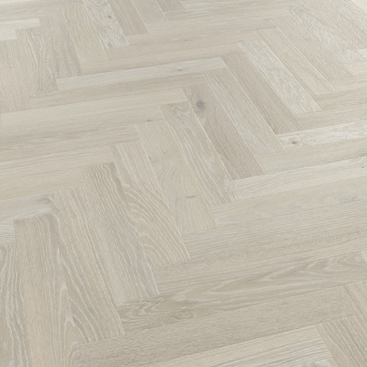 Clay Artisan Oak light grey herringbone lvt flooring laid at an angle